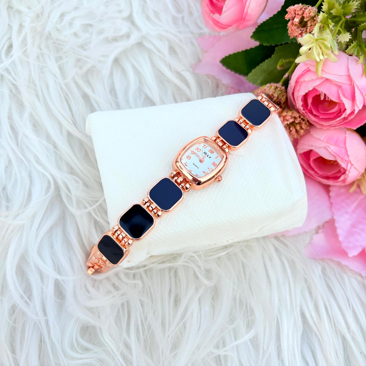 Elegant Rose Gold Bracelet Watch with Black Stone Design