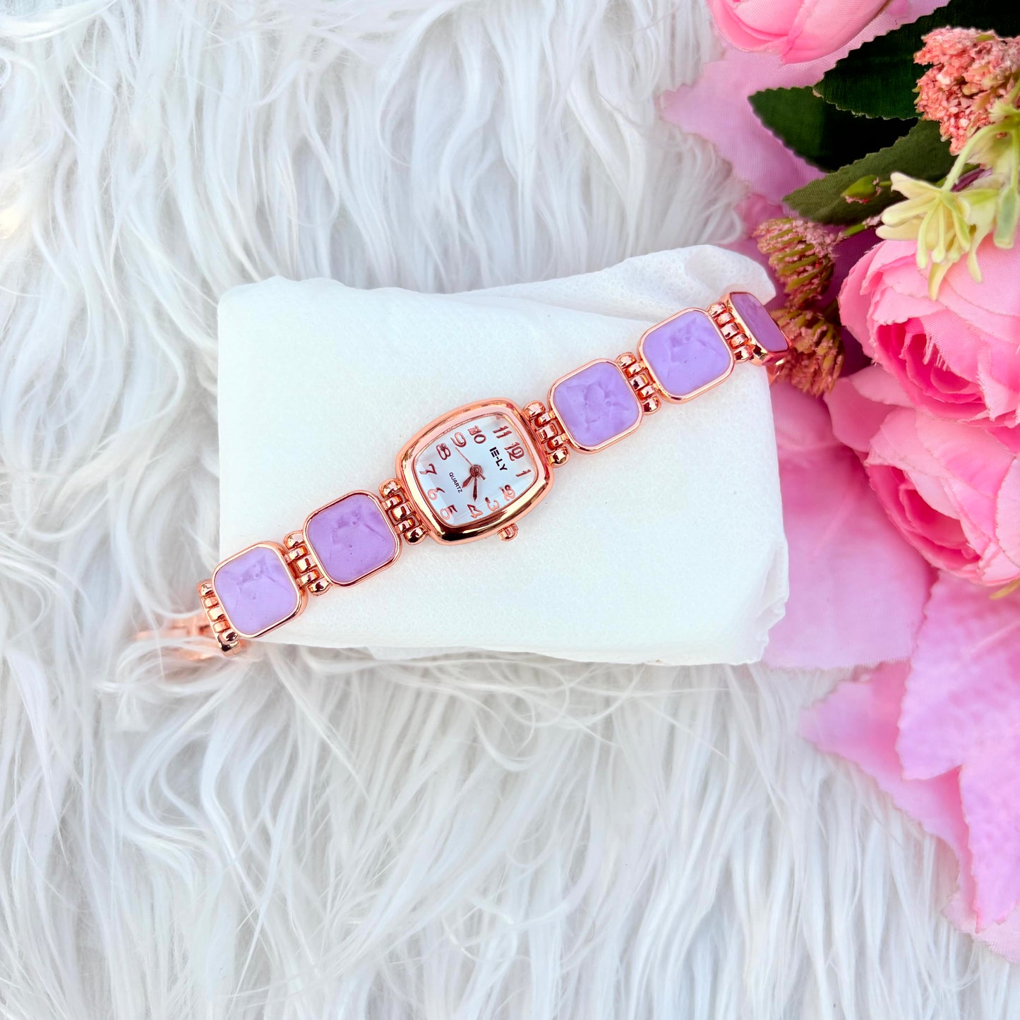 Elegant Rose Gold Bracelet Watch with purple Stone Design