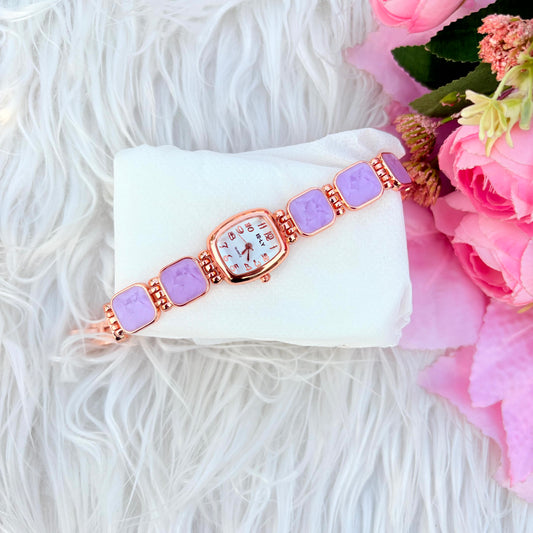 Elegant Rose Gold Bracelet Watch with purple Stone Design